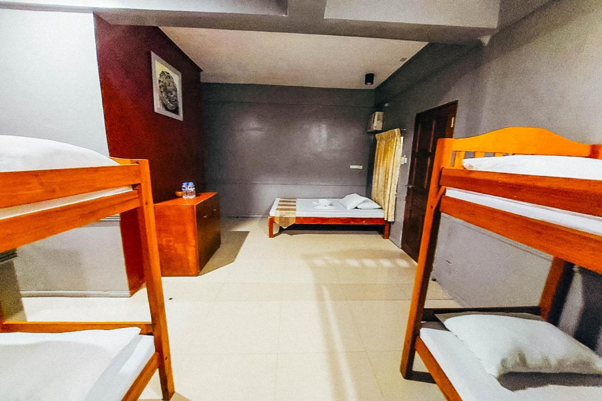 Mbg Travellers Inn Powered By Cocotel Puerto Princesa Δωμάτιο φωτογραφία