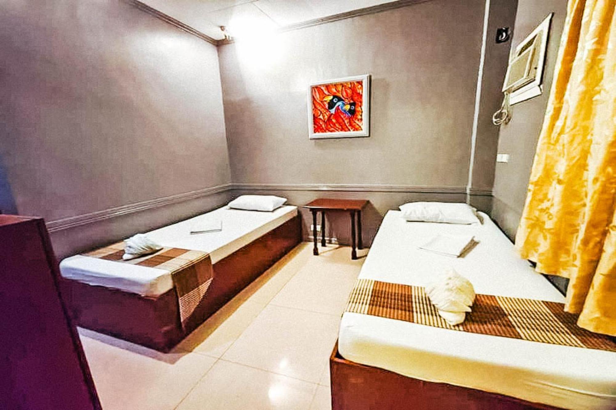 Mbg Travellers Inn Powered By Cocotel Puerto Princesa Δωμάτιο φωτογραφία