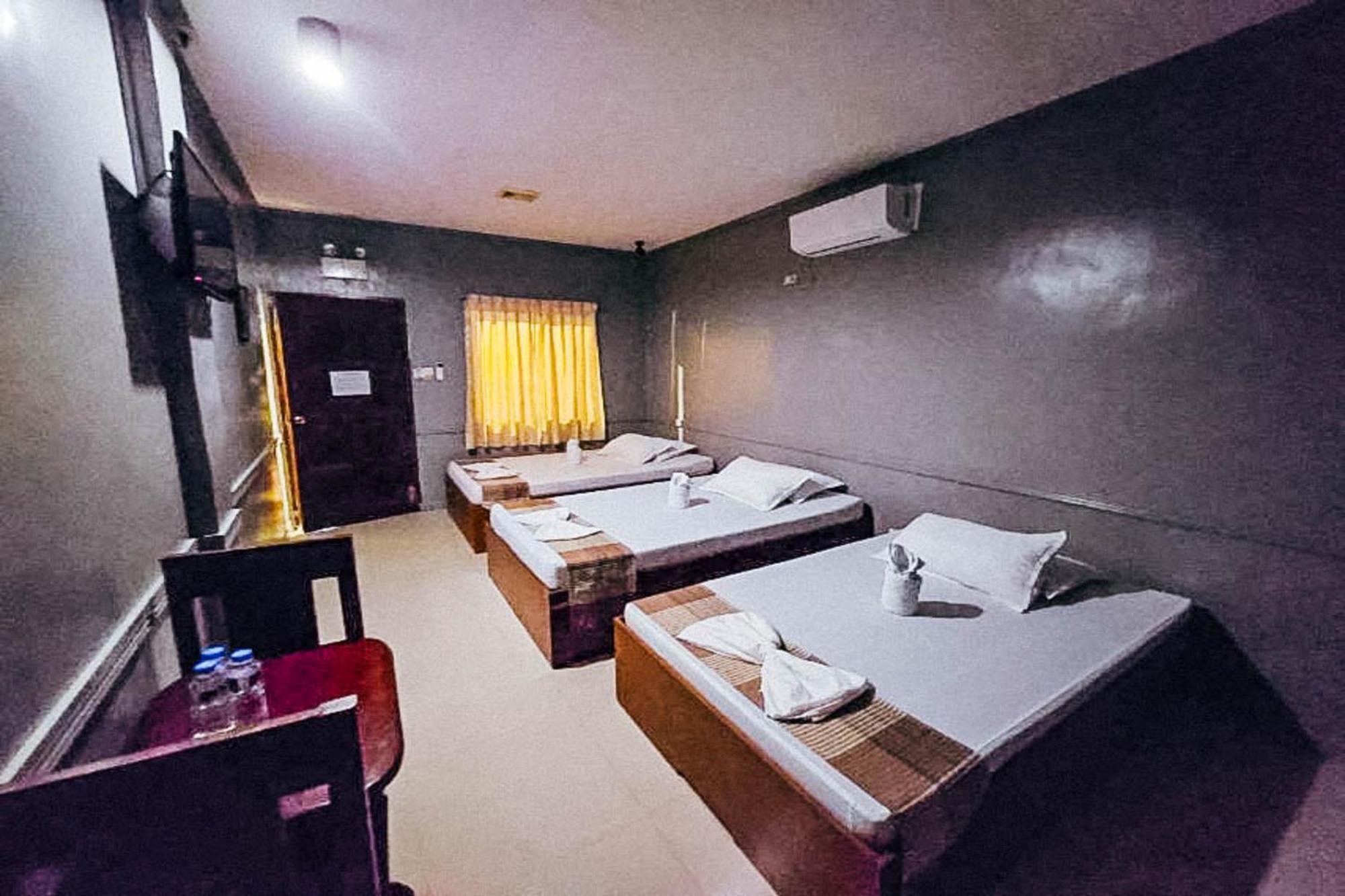 Mbg Travellers Inn Powered By Cocotel Puerto Princesa Δωμάτιο φωτογραφία