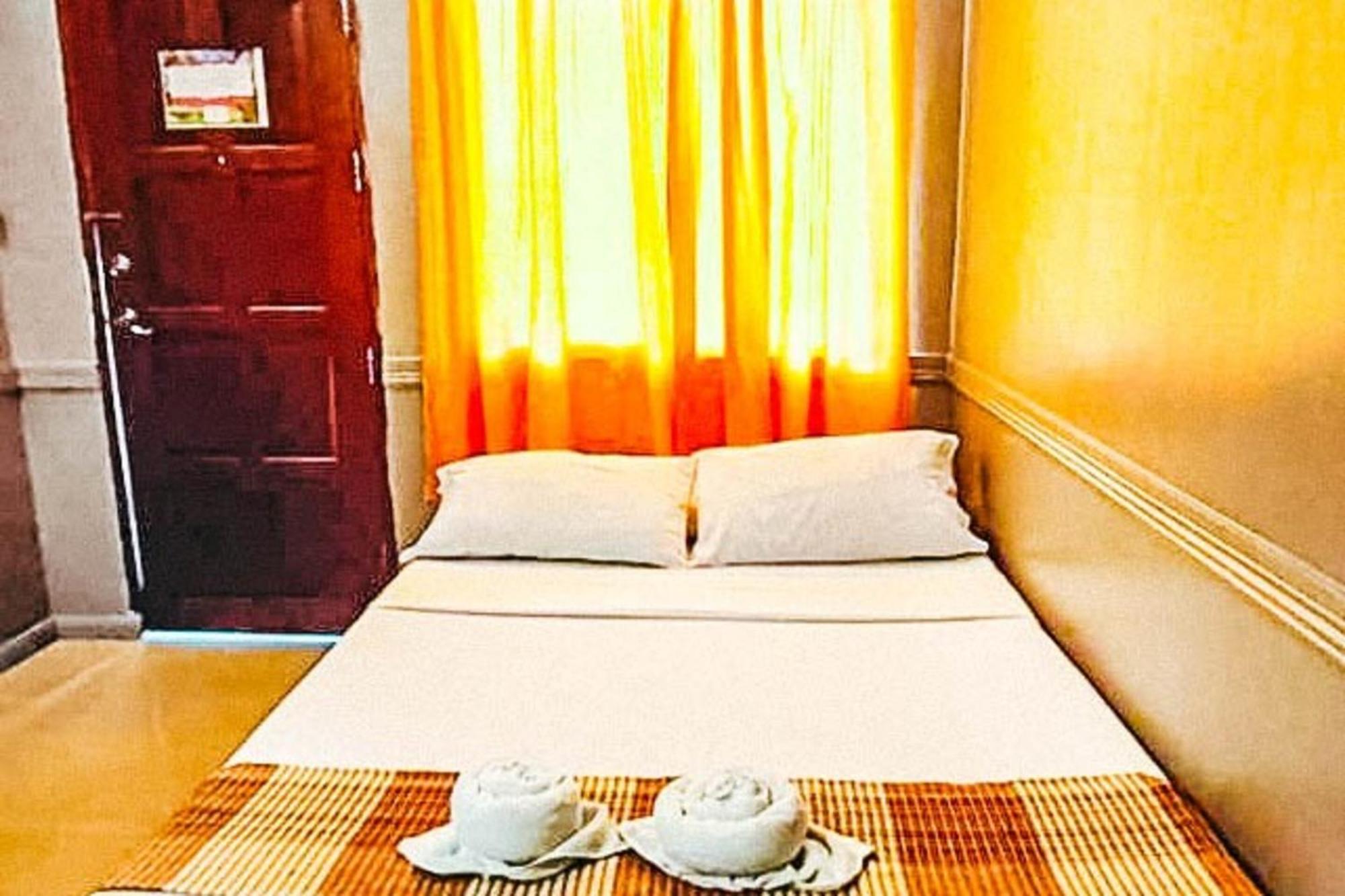 Mbg Travellers Inn Powered By Cocotel Puerto Princesa Δωμάτιο φωτογραφία