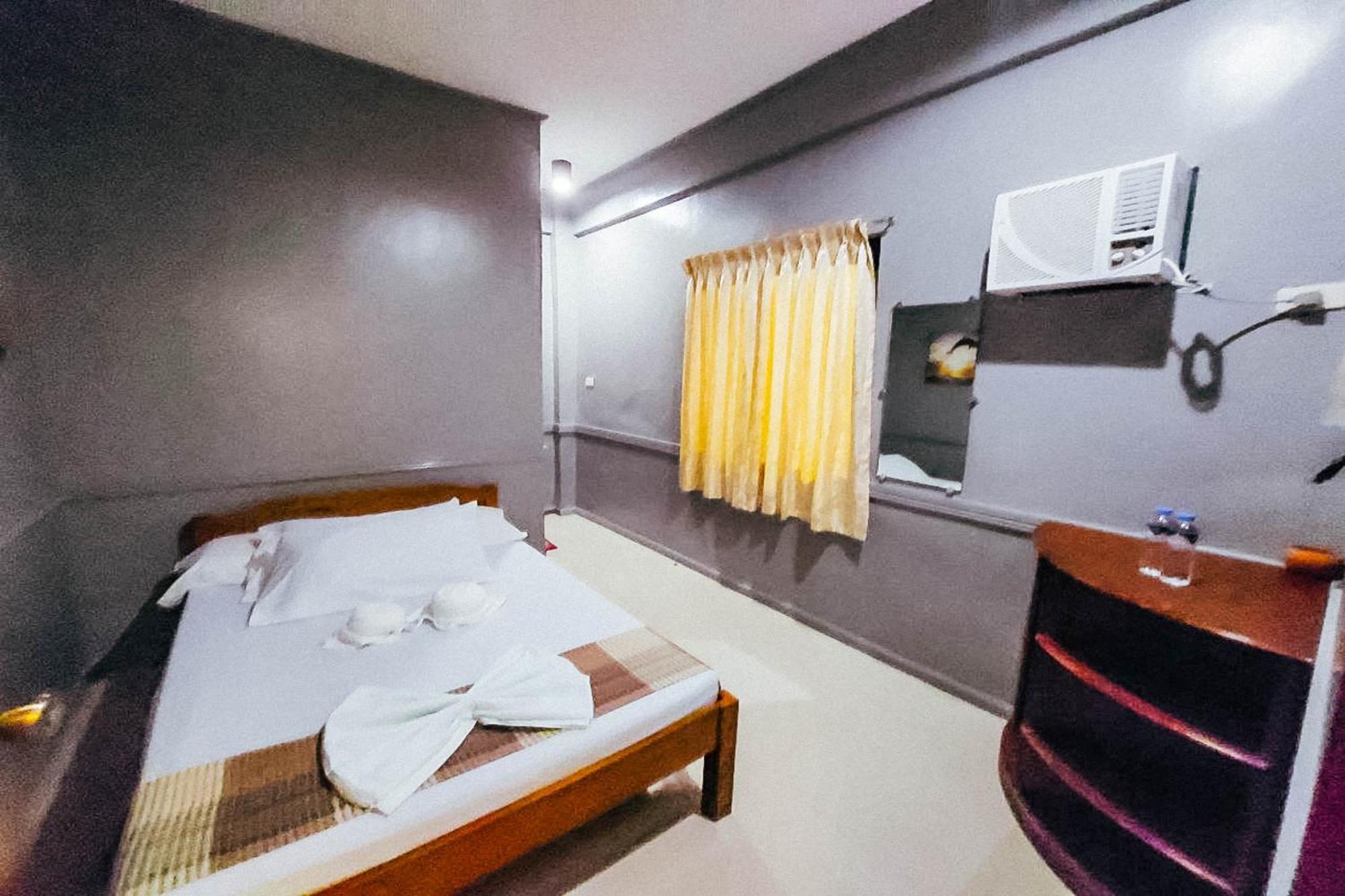 Mbg Travellers Inn Powered By Cocotel Puerto Princesa Δωμάτιο φωτογραφία