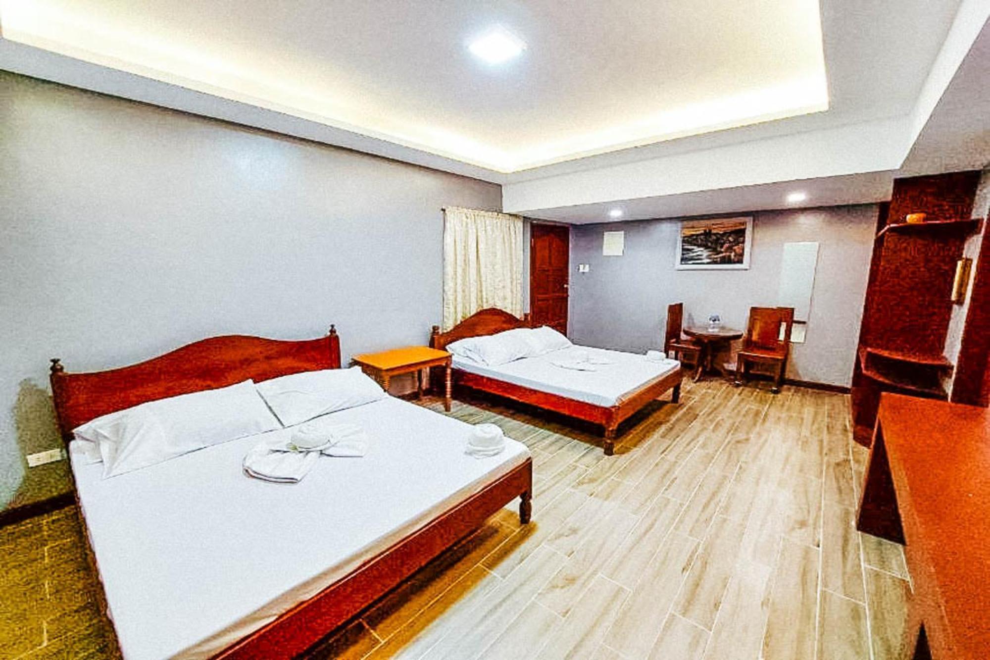 Mbg Travellers Inn Powered By Cocotel Puerto Princesa Δωμάτιο φωτογραφία