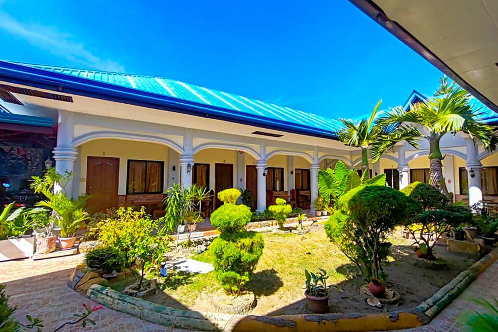 Mbg Travellers Inn Powered By Cocotel Puerto Princesa Εξωτερικό φωτογραφία
